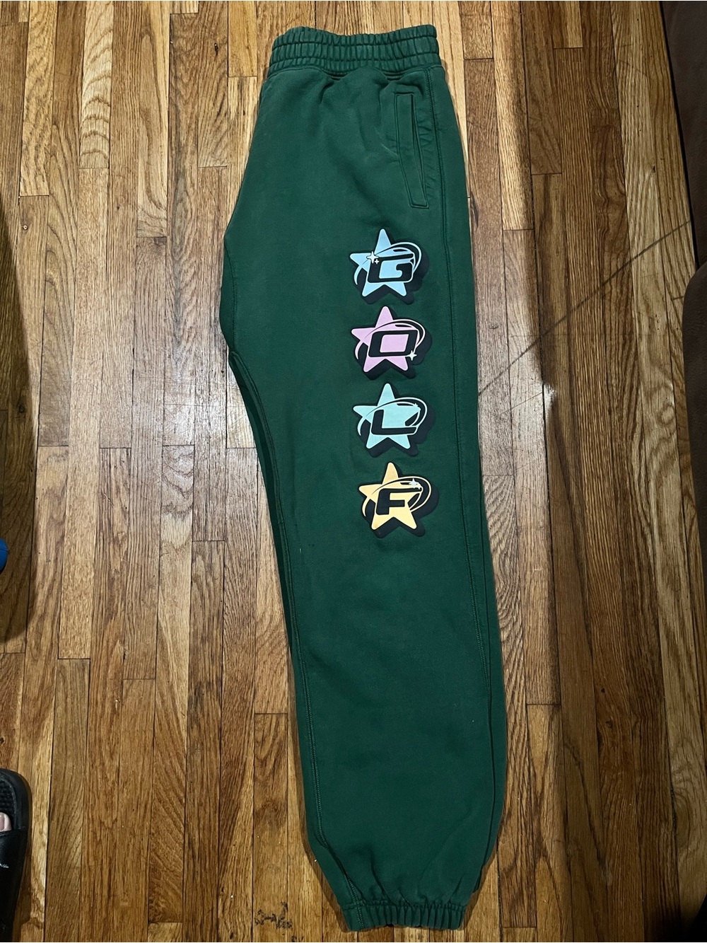 Golf Wang Forest Green Sweatpants with Pastel Star Graphics